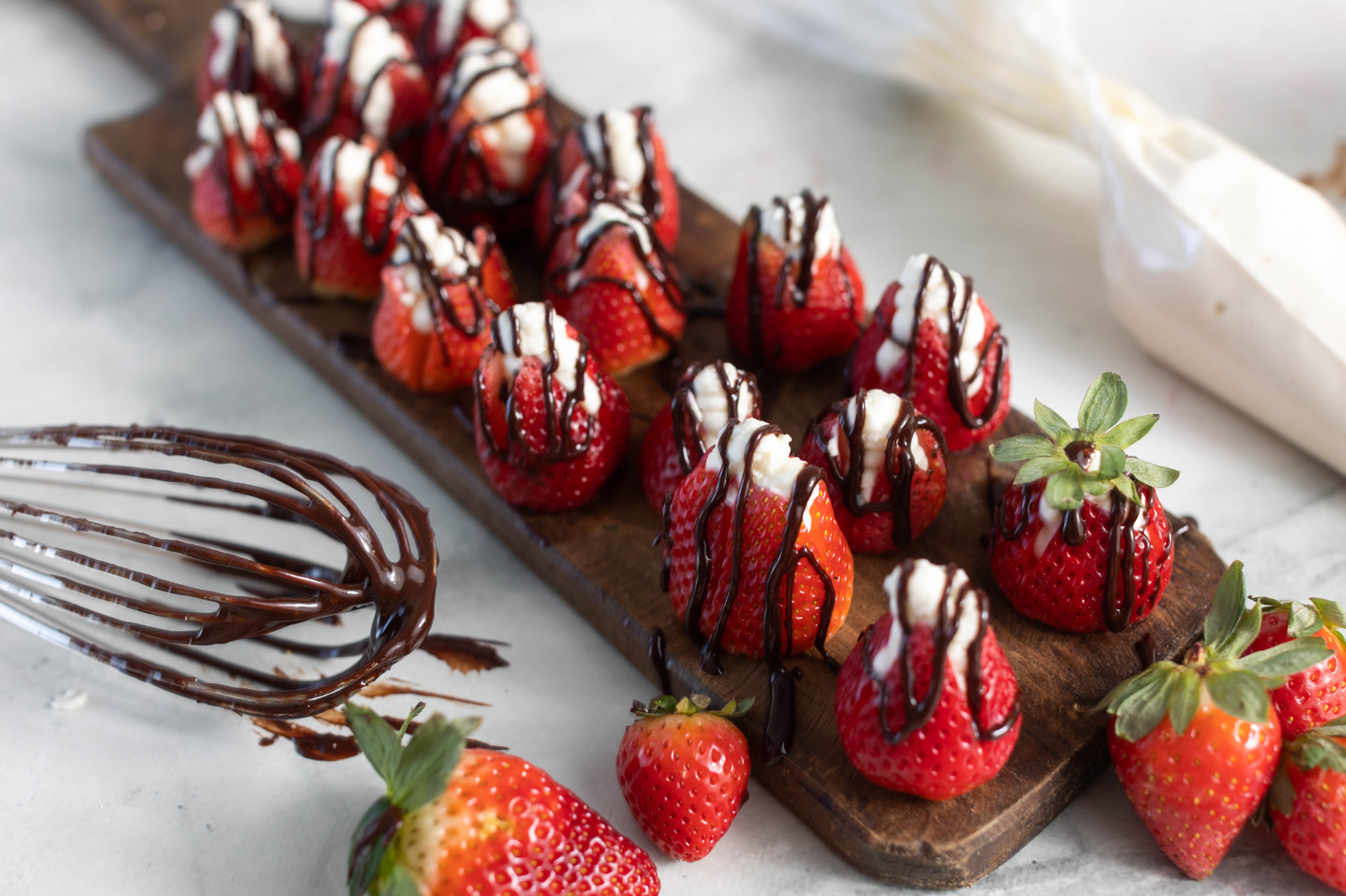 chocolate dipped strawberries filled with Lil' Moo for Valentine's Day
